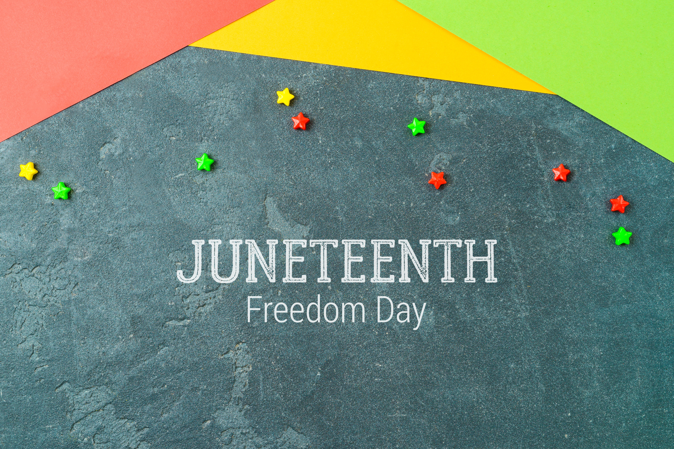 Background for Juneteenth holiday day with colorful paper