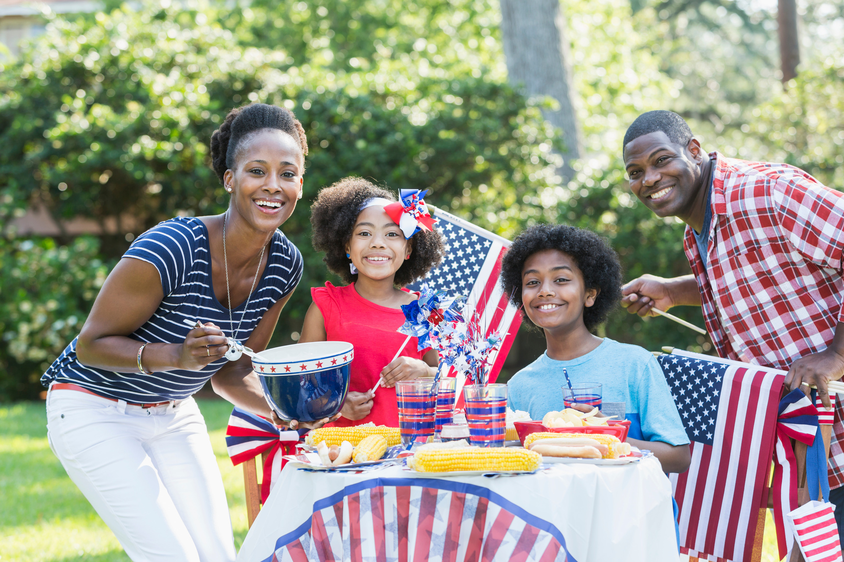 Family having July 4th or Memorial Day picnic